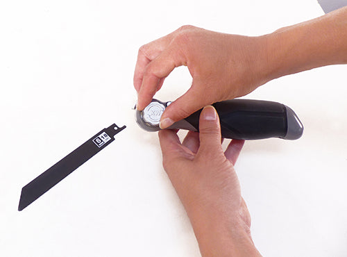 Multifunktionssäge mit verstellbarem Griff